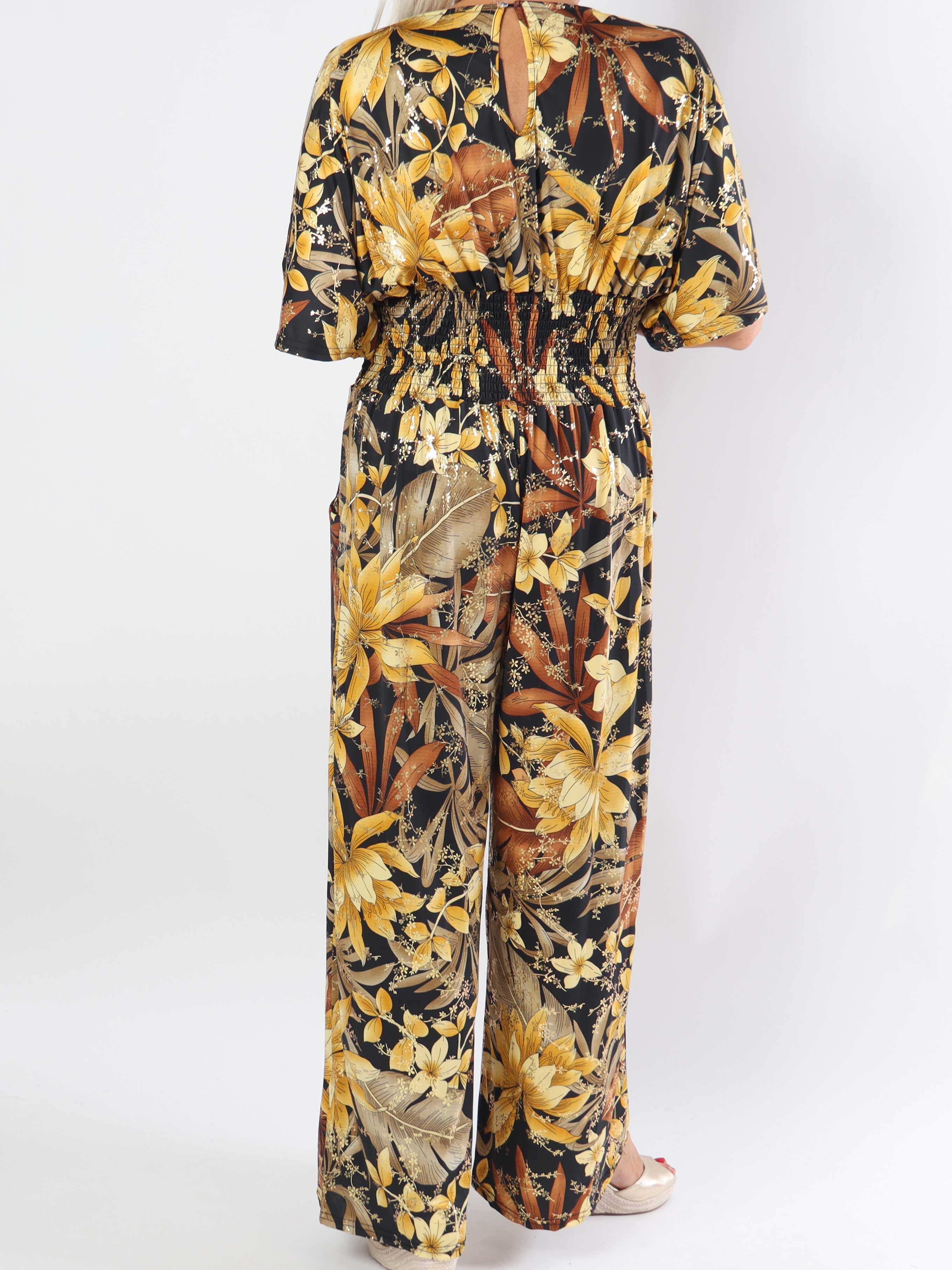 Pams Jumpsuit - Elastisk plus size buksedragt med bladmønster